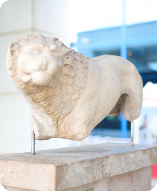 lion sculpture at athens international airport