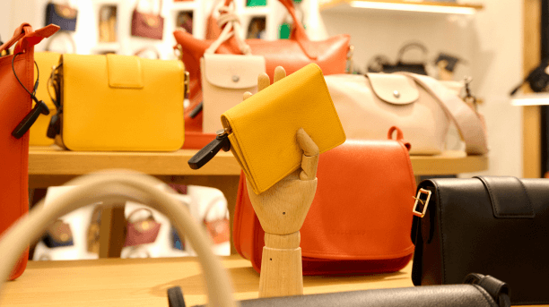 Showcase of shop with bags for women in Athens International Airport